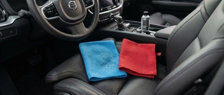 Two microfiber towels for cleaning and buffing interior car glass
