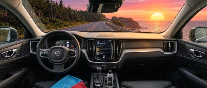 Crystal clear car windshield view after cleaning interior windows