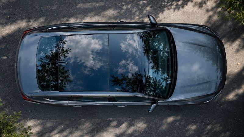 Exterior top view of a luxury sedan showing a dual pane panoramic glass roof